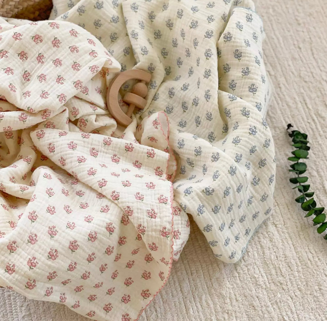 Swaddles and receiving blankets